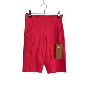Girlfriend Collective pink bike shorts